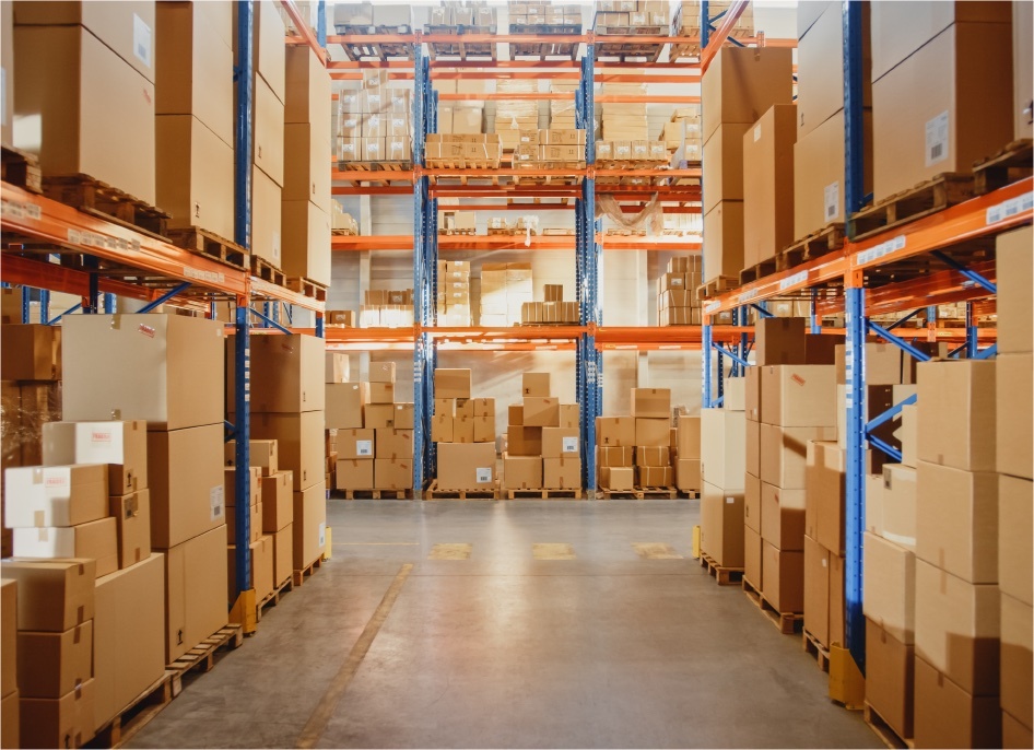 Warehouse aisles with racked, palletized inventory